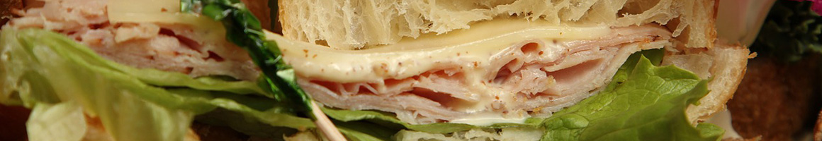 Eating Burger Sandwich Salad at Hueys Germantown restaurant in Germantown, TN.